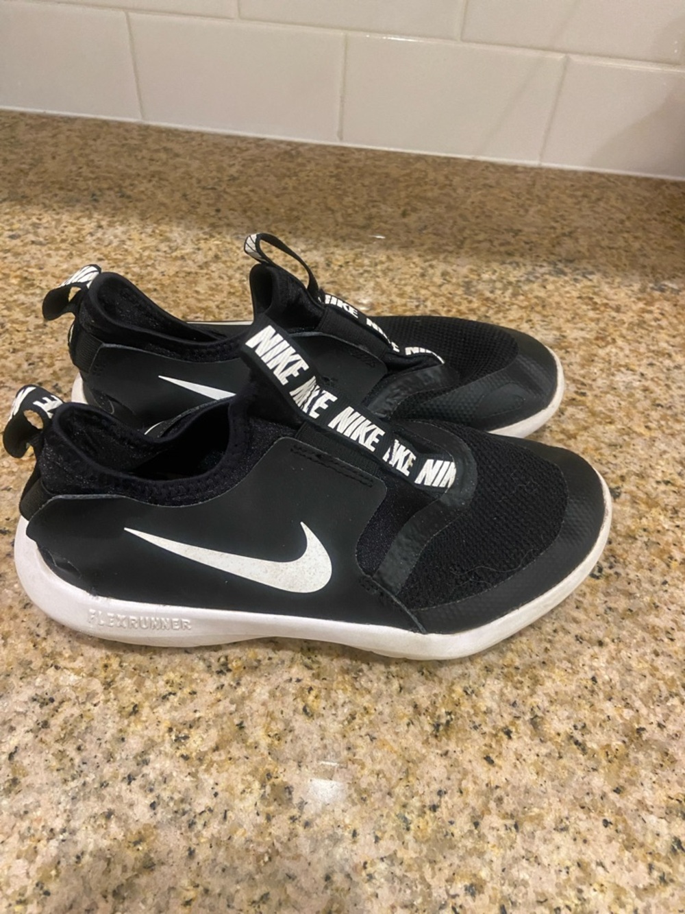 Nike Kids Flex Runner- Black and White Slip-On Sneakers with White Swoosh